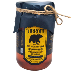 Tarro de miel natural cruda de flores Arkoni, con etiqueta amarilla y diseño artesanal, procedente de Pedro Bernardo (Ávila), España.